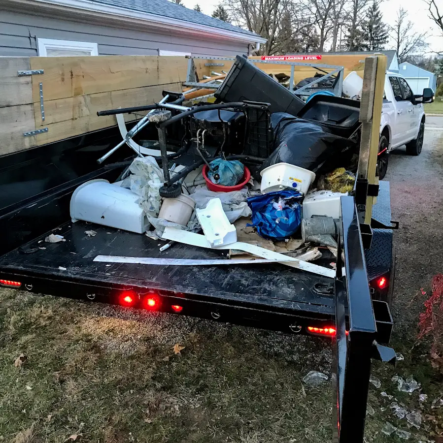 Roll-off dumpster delivered to a residential driveway in Humble