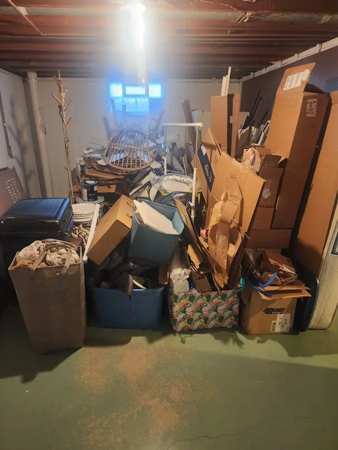 Roll-off dumpster container at job site for 15 Yard Dumpster Rental in Humble